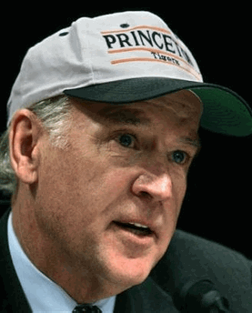 Photo: Senate Judiciary Committee member Sen. Joseph Biden, D-Del.., jokingly puts on a Princeton Tigers cap during Supreme Court nominee Samuel Alito's confirmation hearing on Capitol Hill in Washington Wednesday, Jan. 11, 2006. (AP Photo/Charles Dharapak)