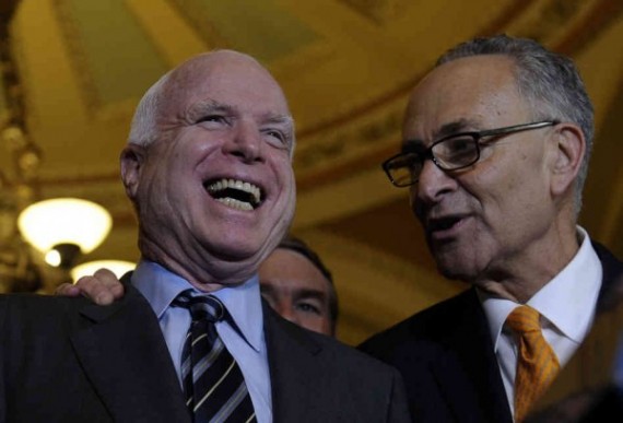 McCain shares a laugh with Chuck Schumer, D-NY