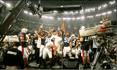 Photo: The Auburn Tigers celebrate after beating Virginia Tech in the Sugar Bowl, finishing a perfect 13-0 season