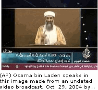 Photo:  Osama bin Laden speaks in this image made from an undated video broadcast, Oct. 29, 2004 by Arab television station Al-Jazeera. In the statement, bin Laden directly admitted for the first time that he carried out the Sept. 11 attacks, and said 