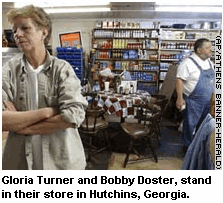 Photo:Gloria Turner and Bobby Doster, stand in their store in Hutchins, Georgia.  
