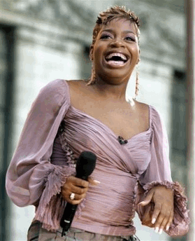 Photo Singer Fantasia Barrino performs on ABC's 'Good Morning America' summer concert series in a New York file photo from July 22, 2005. Barrino reveals in her memoirs that she is functionally illiterate and had to fake her way through some scripted portions the televised talent show, which she won in 2004. (AP Photo/Jeff Christensen, File)