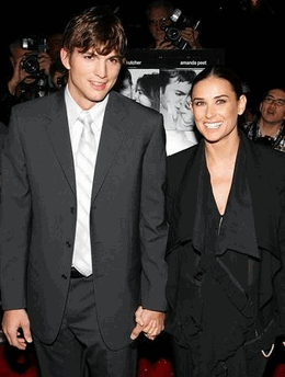 Photo Actors Ashton Kutcher and Demi Moore arrive for the premiere of 'A Lot Like Love' in New York in this April 18, 2005 file photo. Moore and Kutcher were married on Saturday, capping their celebrated two-year-long older woman, younger man relationship, two celebrity magazines reported on September 25, 2005. Representatives for Kutcher, 27, and Moore, 42, could not be immediately reached for comment, but both Us Weekly and People magazine reported on the Web sites that the couple were married in Los Angeles area on Saturday. (Marion Curtis/startraksphoto/Handout/Files/Reuters) 
