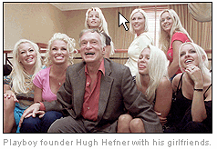 Photo:Playboy Playmates with Hugh Hefner posing for Playboy Video Game 