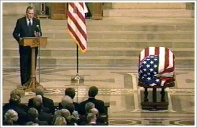 'He believed in America so he made it his shining city on the hill,' says former president George Bush of Reagan. (AP video)