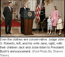 Photo: Even the clothes are conservative: Judge John G. Roberts, left, and his wife Jane, right, with their children Jack and Josie listen to President Bush's announcement. (Pool Photo By Shawn Thew)