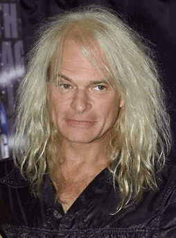 Photo: Infinity Broadcasting isn't commenting on an online report penned by a former Howard Stern Show regular that suggests David Lee Roth will be one of the personalities that ultimately replaces the ribald DJ on the airwaves. Chaunce Hayden, a gossip and celebrity writer for New York/New Jersey entertainment guide SteppinOutMagazine.com, writes that 'an Infinity source has confirmed the signing.' David Lee Roth arrives for a press conference to announce his tour with Sammy Hagar, in this April 16, 2002 file photo. (Adrees Latif/Reuters)