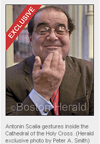Photo: Antonin Scalia gestures inside the Cathedral of the Holy Cross. (Herald exclusive photo by Peter A. Smith)