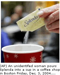 (AP) An unidentifed woman pours Splenda into a cup in a coffee shop in Boston Friday, Dec. 3, 2004...