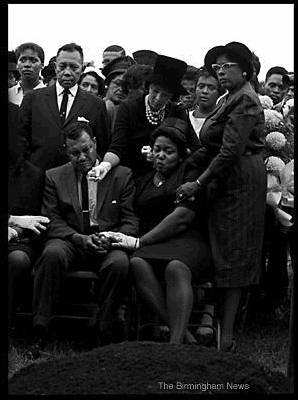 Photo: Sept. 17, 1963: Alvin and Alpha Robertson, seated at graveside, mourn their daughter Carole, a victim of the Sixteenth Street Baptist Church bombing. Robertson died in the bombings days after black students began attending Birmingham schools.