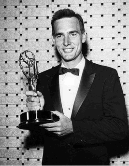 Photo: Actor Dennis Weaver poses with the Emmy award he received as best supporting actor in a dramatic series for his role in 'Gunsmoke' at the 1959 Emmy Awards. REUTERS/Photo Courtesy Academy of Television Arts & Sciences/Handout
