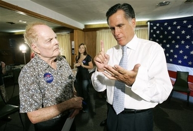 Romney Sons Join Campaign, Not Army Republican presidential hopeful, former Mass. Gov. Mitt Romney, right, talks with Dearld Nanke, of Mechanicsville, Iowa, during a visit to The Cove diner in Moscow, Iowa, Wednesday, Aug. 8, 2007. (AP Photo/Charlie Neibergall)