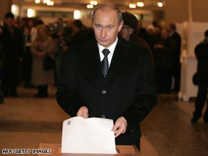 Putin Wins Big in Undemocratic Election President Vladimir Putin casts his ballot in Russia