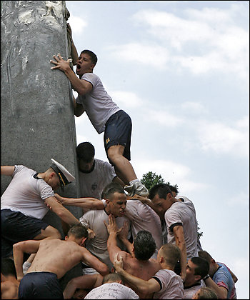 Herndon Climb, Naval Academy Tradition, in Peril Last year's plebes completed the Herndon Climb in 1 hour, 32 minutes and 42 seconds. Photo Credit: By Kevin Clark -- The Washington Post