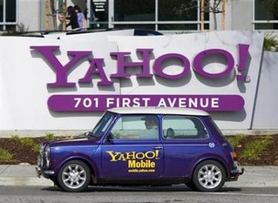 Yahoo Shareholders Sue over Microsoft Bid Rejection A man drives a Mini Cooper with a Yahoo! logo in front of Yahoo! headquarters in Sunnyvale, February 1, 2008. Microsoft will authorize a proxy battle for Yahoo this week to convince the Web company's shareholders to agree on a takeover deal that the Yahoo board so far has rejected, the New York Times' DealBook blog said on Tuesday. (Kimberly White/Reuters)