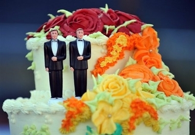 Gay Wedding Cake A wedding cake with statuettes of two men is seen in West Hollywood, California, May 15. California will hold its first gay marriages starting on June 17, state authorities told its public officials Wednesday, two weeks after the state Supreme Court quashed a ban on gay marriage in a historic ruling. (AFP/Gabriel Bouys)