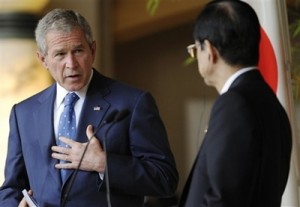 US President George W. Bush, left, gestures during a joint press conference with Japanese Prime Minister Yasuo Fukuda at the G8 summit Sunday, July 6, 2008 in the lakeside resort of Toyako on Japan\'s northern island of Hokkaido. (AP Photo/Evan Vucci) 