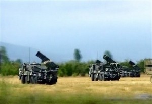 n this picture made off APTN video footage, Georgian multiple rocket launchers are seen at a position south of Tskhinvali, Friday morning, Aug. 8, 2008. The capital of Georgia\'s separatist region of South Ossetia came under heavy fire early Friday, just hours after Georgia\'s president declared a unilateral cease-fire. (AP Photo/APTN) 