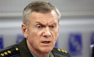 In this Aug. 13, 2008 file photo, Russia\'s deputy chief of General Staff Col.-Gen. Anatoly Nogovitsyn addresses the media in Moscow. Nogovitsyn said Friday, Aug. 15, 2008 that Poland\'s agreement to accept a U.S. missile defense battery exposes the country to attack, pointing out that Russian military doctrine permits the use of nuclear weapons in such a situation, the Interfax news agency reported. (AP Photo/Misha Japaridze, File)