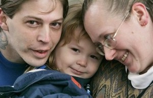 Heath Campbell, left, with his wife Deborah and son Adolf Hitler, 3, pose in Easton, Pa., Tuesday, Dec. 16, 2008. Deborah and her husband Heath attempted to buy a birthday cake for their son at a near by ShopRite supermarket in Greenwich, N.J. and were told that the store would not inscribe Happy Birthday Adolf Hitler on the cake. The Campbell's also have two daughters, JoyceLynn Aryan Nation and Honszlynn Hinler Jeannie. (AP Photo/Rich Schultz)