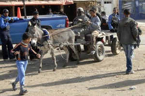U.S. Army military police and Iraqi police play with children in Sab al Bor, Iraq, Dec. 22, 2007. (U.S. Air Force photo by Tech. Sgt. William Greer)