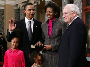 WASHINGTON - JANUARY 4:  U.S. Senator Barack Obama (D-IL) (2nd L) poses for with his wife Michelle (2nd R), Vice President Dick Cheney (R), daughters (C) Malia and Sasha during the reenactment of a swearing -in ceremony on Capitol Hill January 4, 2005 in Washington, DC. The 109th Congress was sworn in January 4.  (Photo by Alex Wong/Getty Images)