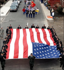 Veterans Day in Maysville, Ky. Photo Credit: By Terry Prather -- Associated Press