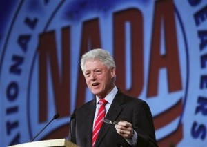 Former President Bill Clinton speaks to the National Automobile Dealers Association during their meeting in New Orleans Monday, Jan. 26, 2009. (AP Photo/ Judi Bottoni)