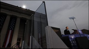 At a stop in Baltimore, Md., bulletproof glass flanks President-elect Barack Obama. (By Charles Dharapak -- Associated Press)