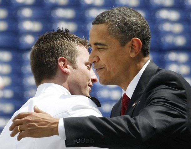 U.S. President Barack Obama (R) hugs graduate John S. McCain IV (L), son of U.S. Sen. John McCain, while attending the 2009 U.S. Naval Academy graduation in Annapolis, Maryland, May 22, 2009.