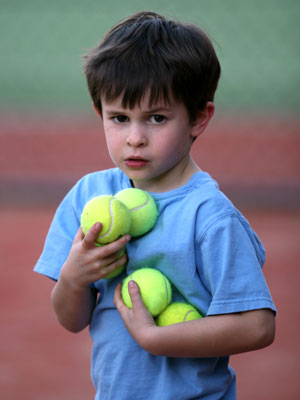 boy-with-tennis-balls