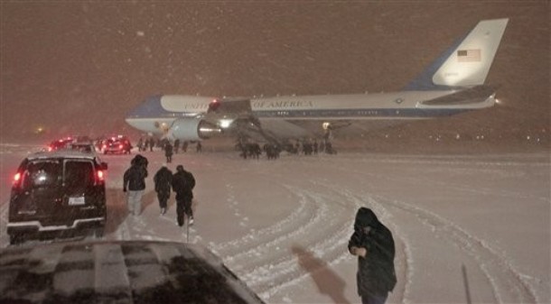 The presidential motorcade heads towards Air Force One to pick up President Barack Obama, not pictured, during a snow storm at Andrews Air Force Base, Md. , as he returned from the climate conference in Copenhagen, early Saturday, Dec. 19, 2009. President Obama typically travels via Marine One helicopter from Andrews Air Force Base to the White House but a motorcade was used due to inclement weather.
