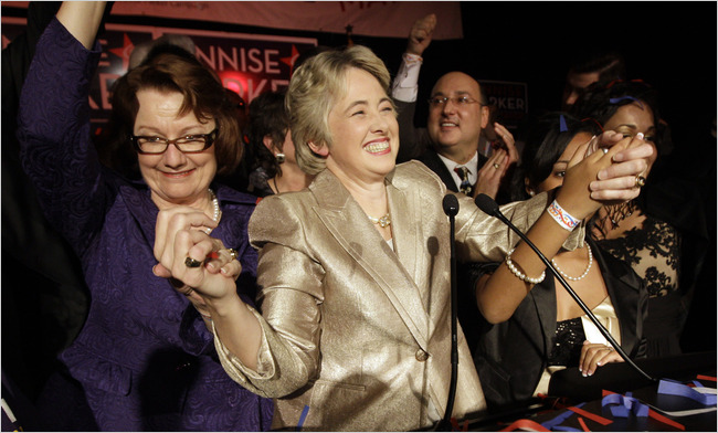 Houston Mayor-elect Annise Parker, center, celebrates with her partner Kathy Hubbard, left, Parker's runoff election victory at a campaign party on Saturday in Houston. David J. Phillip/Associated Press