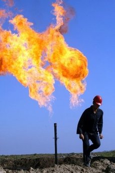 An Iraqi worker walks at the Halfaya oil field near the southern city of Amara on December 12. Iranian forces have taken control of a southern Iraqi oil well on a disputed section of the border, US and Iraqi officials have told AFP. (AFP/Essam al-Sudani)