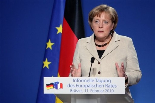 German Chancellor Angela Merkel gestures while speaking during a media conference after an EU summit in Brussels, Thursday, Feb. 11, 2010. Germany and France dangled a limited promise of "political support"  but no financial aid for debt-burdened Greece at a meeting of European Union leaders Thursday, trying to defuse market fears about the about the future of the euro and Europe's economic unity. (<i></i>)