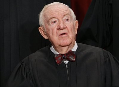 In this Sept. 29, 2009, file photo Associate Justice John Paul Stevens sits for a new group photograph at the Supreme Court in Washington. Stevens, the oldest justice who turns 90 this April 2010, says he'll decide soon about retiring, for his own peace of mind and to give President Barack Obama and the Senate plenty of time to replace him. (AP Photo/Charles Dharapak, File)